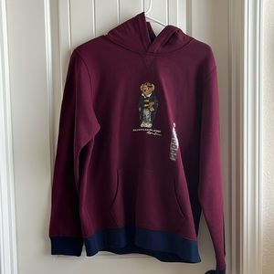 I’m selling a brand new boys polo hoodie with tag. size XL in boys
